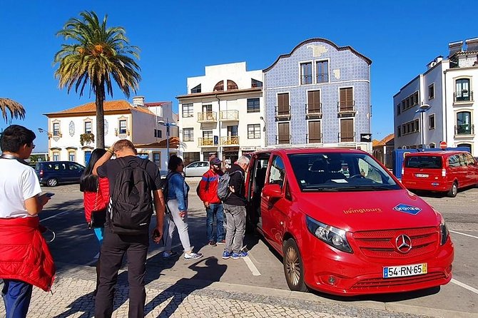 Aveiro and Costa Nova Half Day Tour from Porto with Boat Ride - Costa Nova do Prado: striped huts, beach-road views, and brief shoreline time