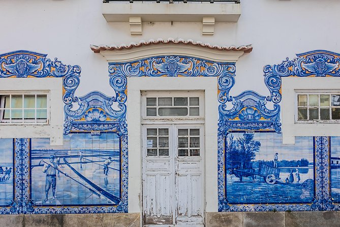 Aveiro Half Day Private Tour Porto w/ Moliceiro River Cruise - Costa Nova: Palheiros striped houses, beach photos, and bird sightings