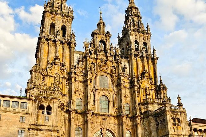 Day Trip from Porto to Santiago de Compostela and Valença - Porto departure, border crossing, and the guide on the bus