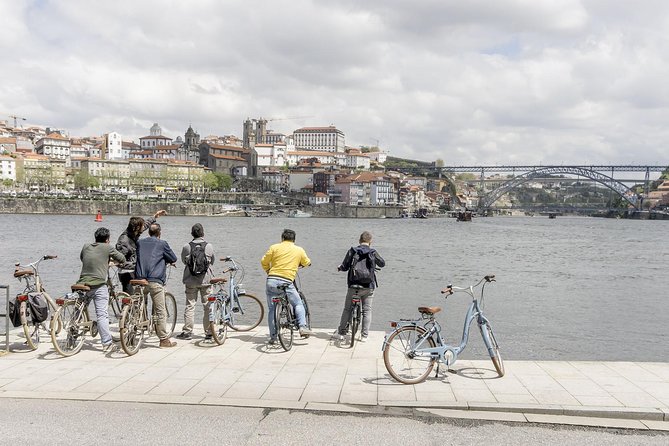 Experience Porto by Bike: 3-Hour Private Tour - Back to the Riverfront Icons: Douro Boat Crossing, Wine Cellars, and Ribeira