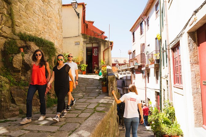 Experience Porto's Charm: 3-Hour Guided Walking Tour - UNESCO center basics: Roman walls, Moorish influence, and later trouble