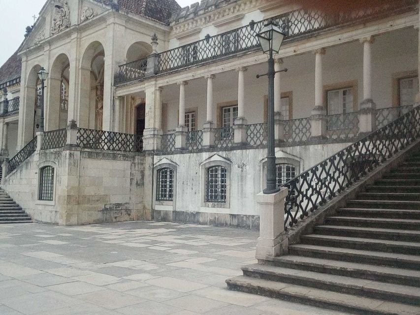 From Porto: Aveiro & Coimbra Tour with Moliceiro Boat Cruise - Salt pans and New Coast striped houses