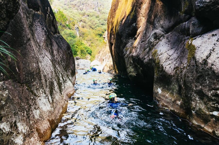 From Porto: Gerês National Park Canyoning Trip - The canyon route: swimming, sliding, and stepping over boulders