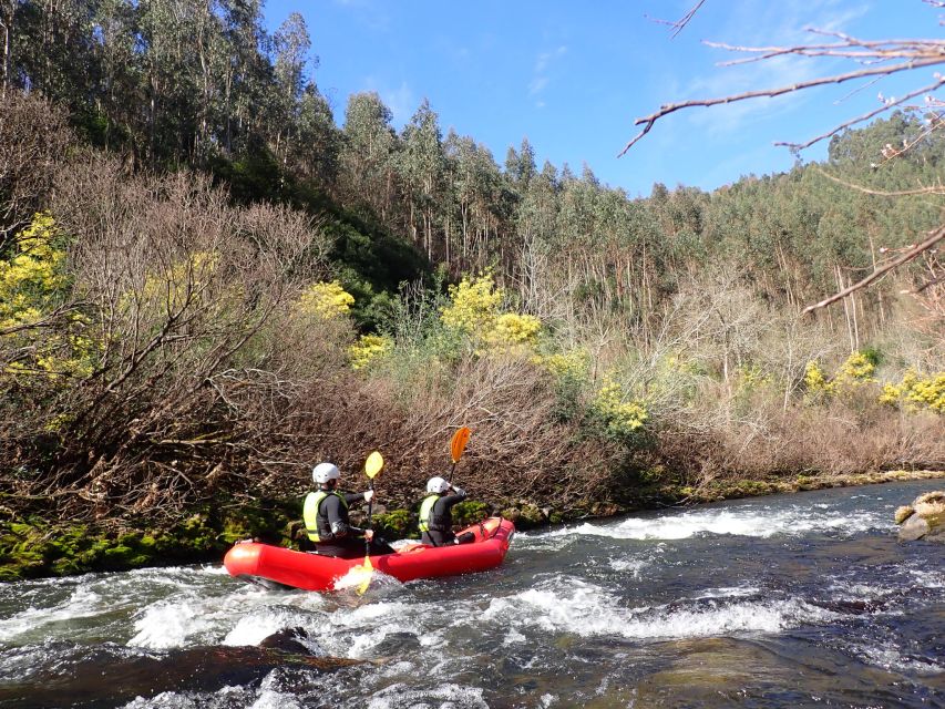 From Porto: Paiva River Canoe Rafting Adventure Tour - Paradinha Village setup: equipment, boat seating, and swim-ready basics