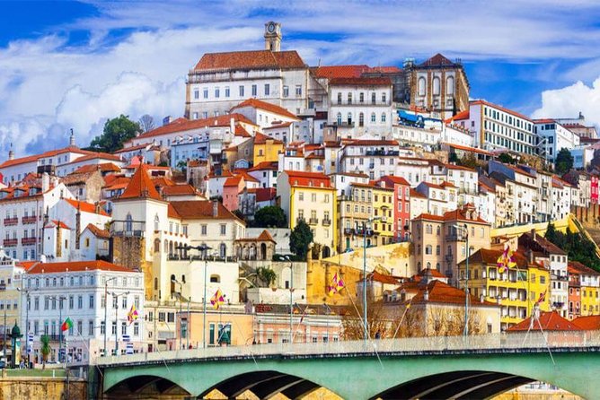 Full Day Tour from Porto to Coimbra and Aveiro with River Cruise - Stop 3: Costa Nova fish market village, simple, local, and free