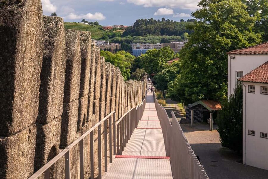Guimarães: Flexible Walking Tour in Historic Center - Oliveira Square: Collegiate Church of Our Lady of Oliveira and the Salado Monument