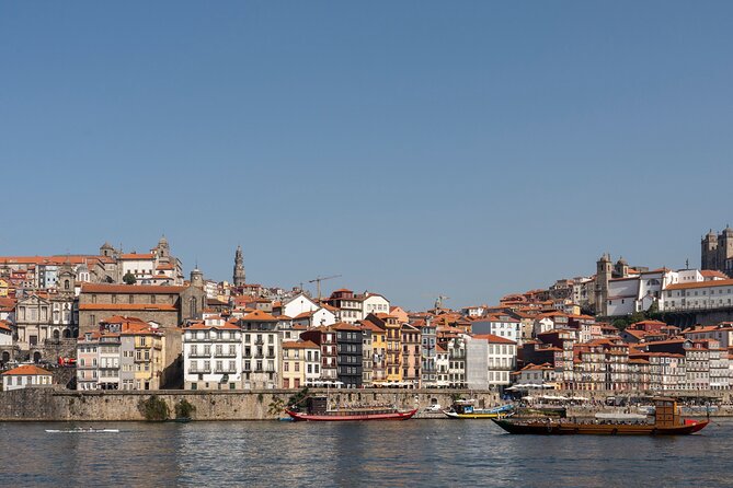 Porto 360°: Helicopter Flight, Guided Walking Tour & River Cruise - Douro River cruise to Dom Luis I Bridge: peaceful views, and bring your headphones