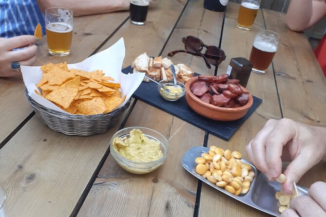 Porto: Craft Beer Tasting Tour with Local Snacks - Beer garden finish with 4 more craft beers and snacks