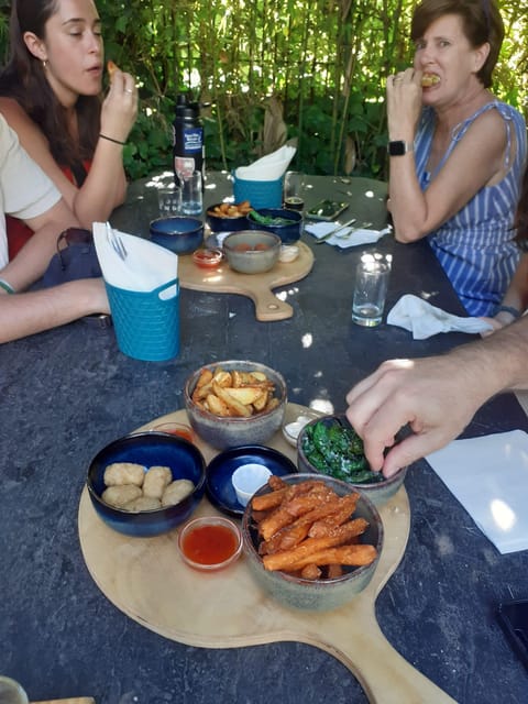 Porto: Craft Beer Tasting Tour with Local Snacks - Language, guide style, and what to expect from the group