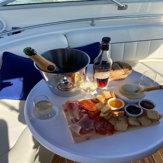 Porto: Douro River Boat Tour w/ Portuguese Wines & Tasting - The skippers and the tripeiro stories you came for