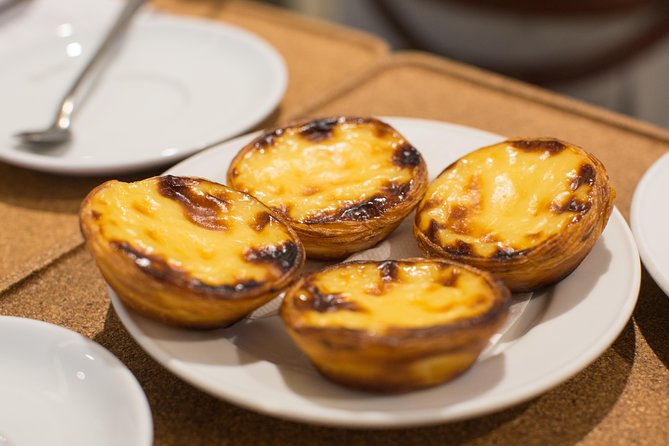 Porto Food & Wine Tasting Tour with Lunch or Dinner Option - Bifana, charcuterie, and that long-running smoked meat shop