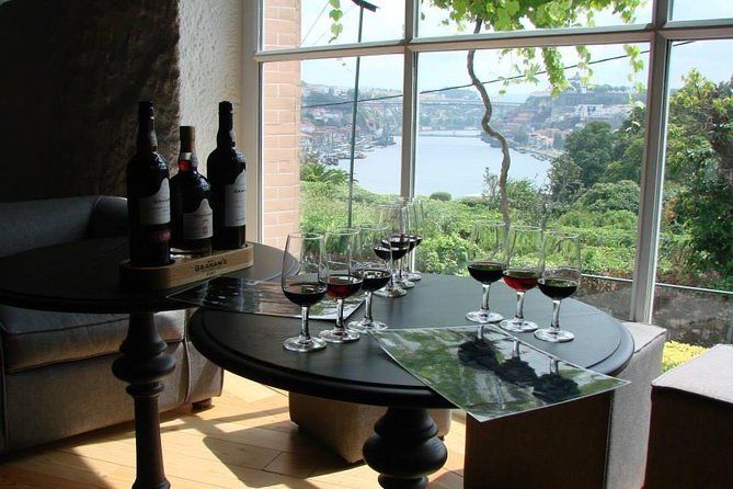 Porto Full Day City Tour Wine Tasting and Six Bridges Cruise - Historic Centre walk: UNESCO streets, medieval feel, and quick stops