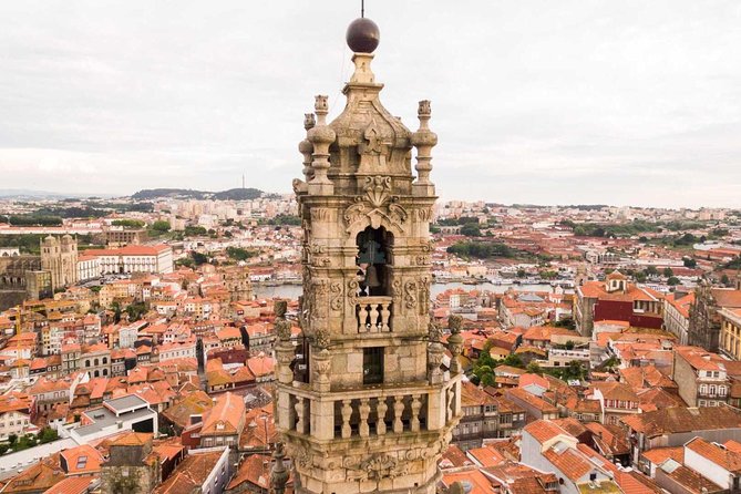 Porto Full Day City Tour Wine Tasting and Six Bridges Cruise - Clerigos Church, baroque Porto, and planning around what is not included
