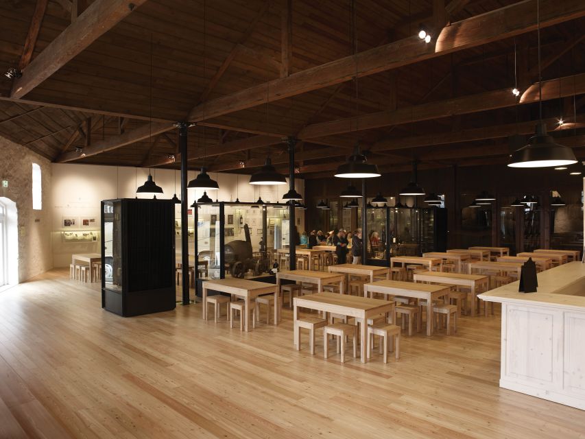 Porto: Graham's Port Lodge Tour with Premium Wine Tastings - Inside the 1890 Lodge, Where the Production Is Still Real