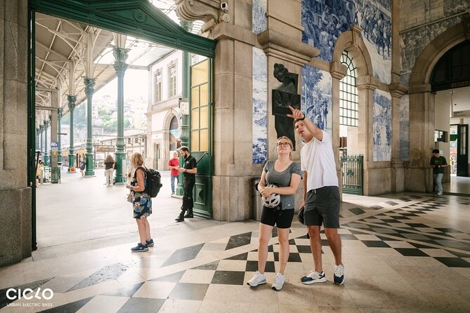 Porto Highlights in 3 Hours E-Bike Tour - Historical, Sightseeing - São Bento Railway Station: azulejos tiles that practically steal the show
