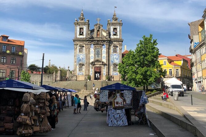 Porto Private Gourmet Food & Wine Historic Tour with a Sommelière - São Bento Station tiles: your fast Porto history crash course