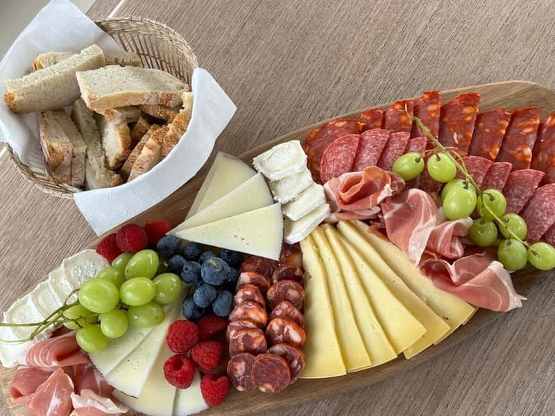 Porto: Private Yacht Cruise with Local Wines & Snacks - Freixo Marina, the welcome drink, and passing the first Porto bridges