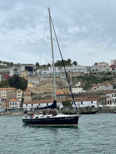 Porto: The Best Douro Boat Tour - Clérigos Tower and Porto Cathedral from the Douro: how the skyline makes sense