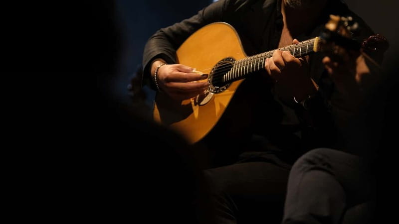 Porto: The highest-rated traditional fado concert (downtown) - Your pre-show moment: a glass of Port and a short set-up