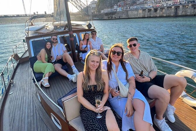 Porto: Tour on the Douro River in a Classic Boat - Hosts, Music, and the Photo-Friendly Sunset Moment