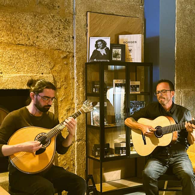 Porto: Traditional Fado Show with Welcome Drink - Entering A Centenarian Fado House In Porto