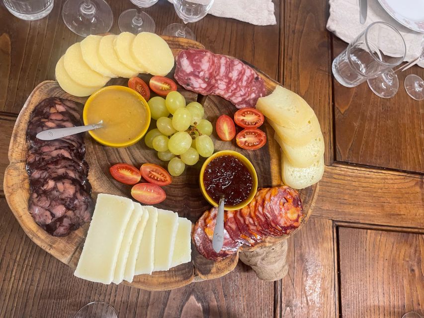 Portuguese Wine Tasting w Local Cheese & Cold Cuts pairing - Green, White, Red wines: understanding Portugal through three distinct pours