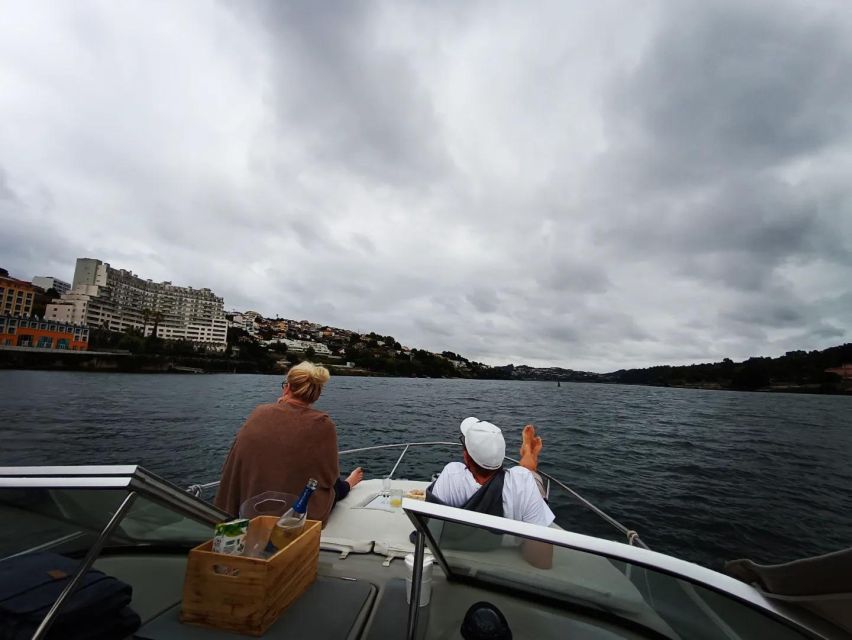 Private Boat Trip for 2 with Tasting in Porto -Sunset Option - Returning toward the waterline: a second look at Porto and Gaia