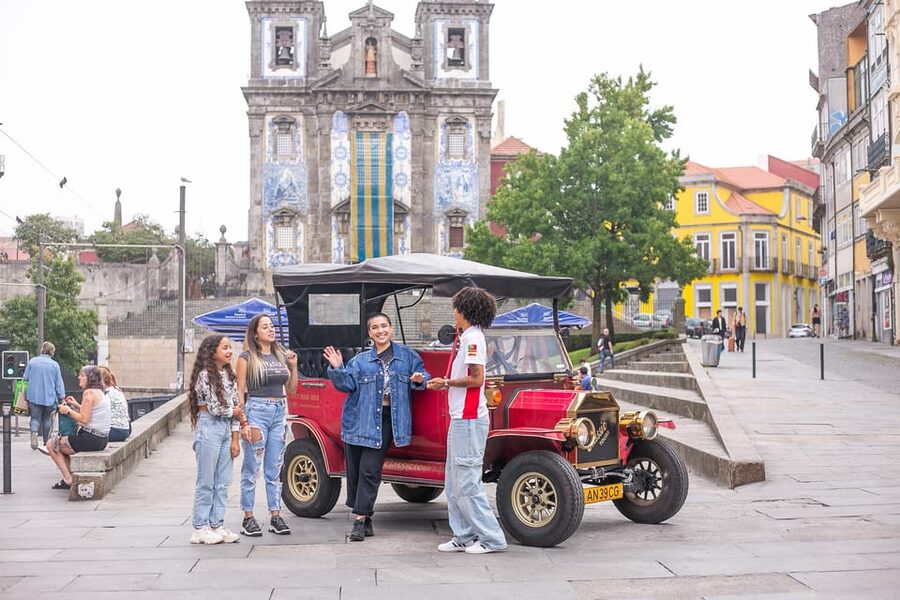 Tour Porto: Classic Adventure in Electric Tuk Tuk - Ribeira lanes and Douro River views from street level
