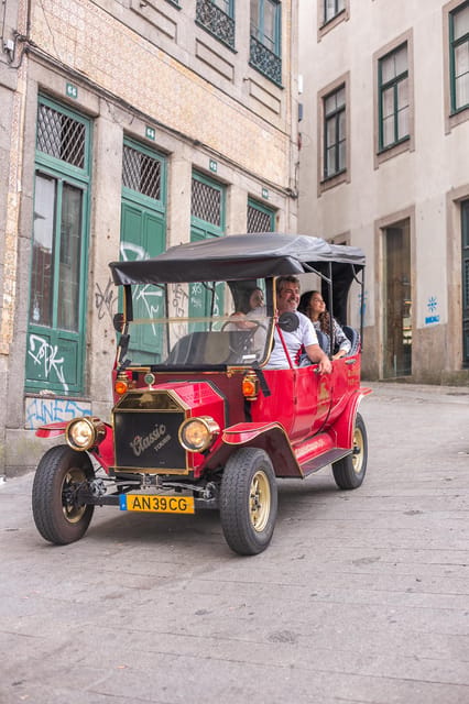 Tour Porto: Classic Adventure in Electric Tuk Tuk - Comfort in a small electric vehicle, what to watch
